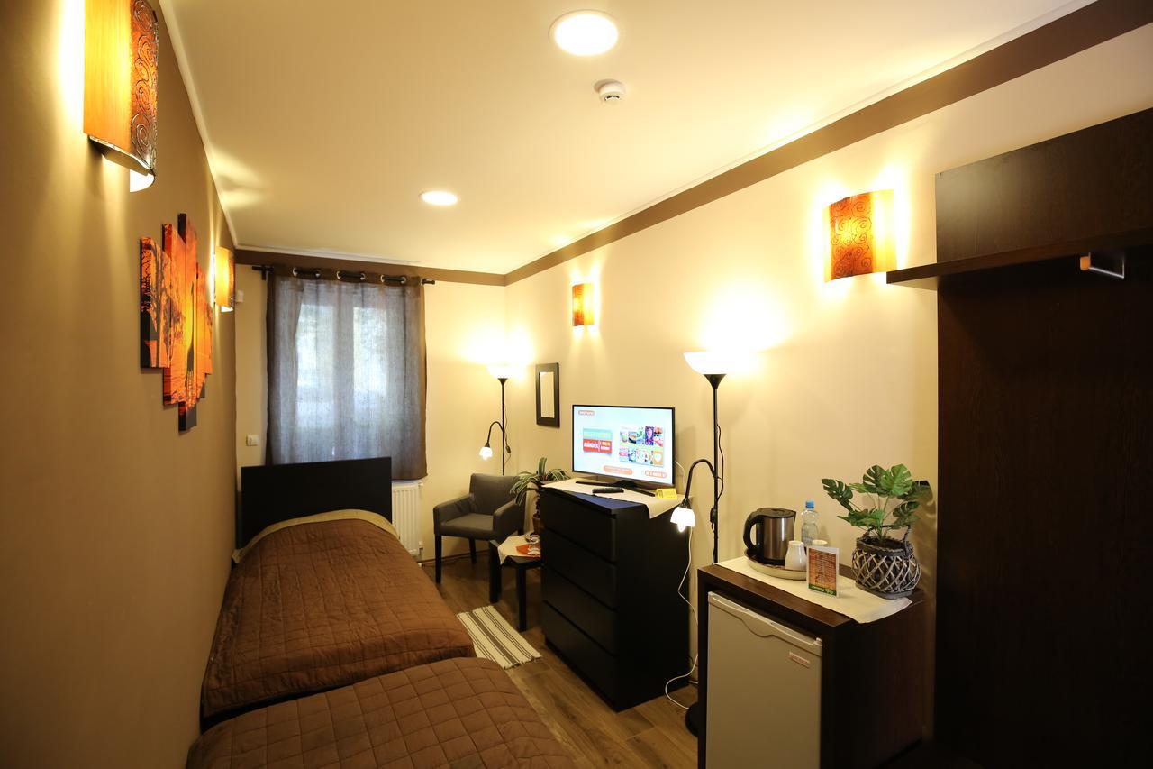 Napraforgo Wellness Haz Es Panzio Bed & Breakfast Pecs Bagian luar foto